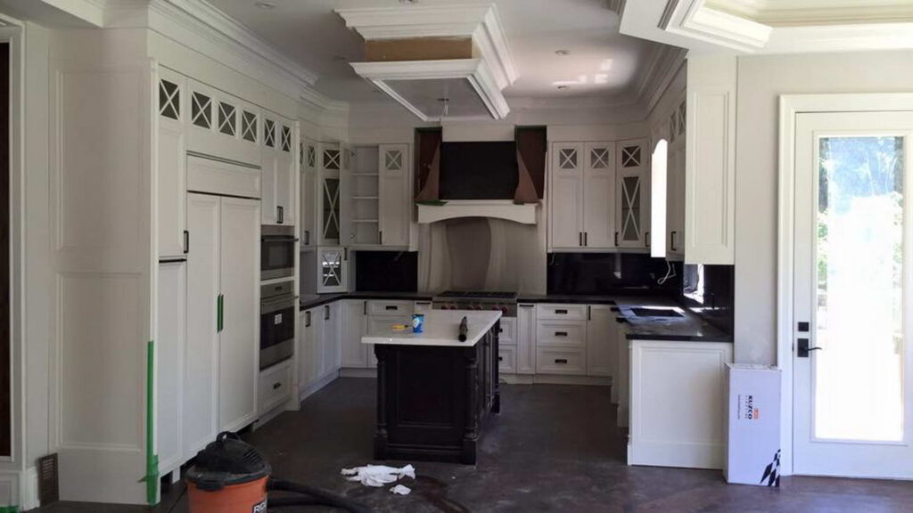 customized white kitchen cabinets with island installation