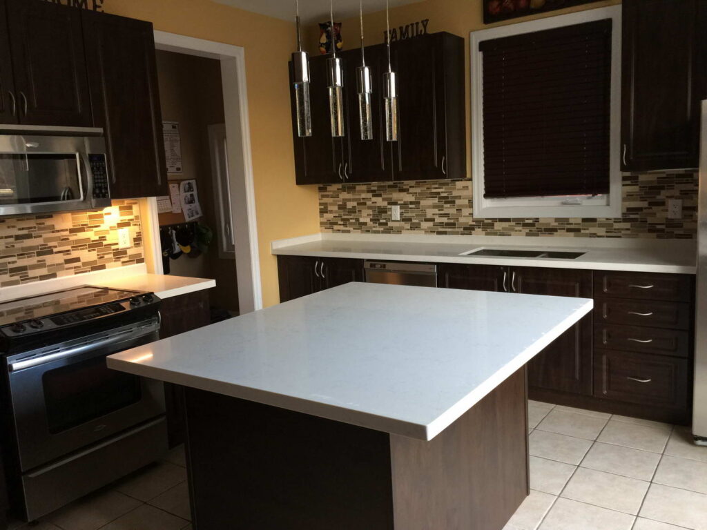 mosaic tiled kitchen wall with classic wooden cabinets center island installed