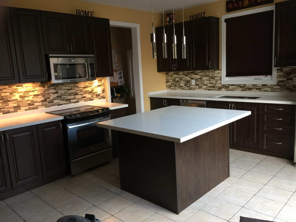 White glossy countertop with wooden cabinets and matching island